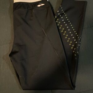 Brooks Running Black Leggings with reflective accents.
